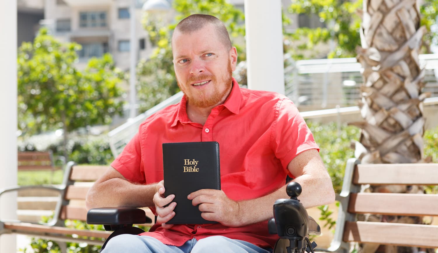 wheelchair-holding-bible.jpg