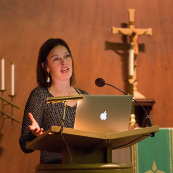 female speaker at podium